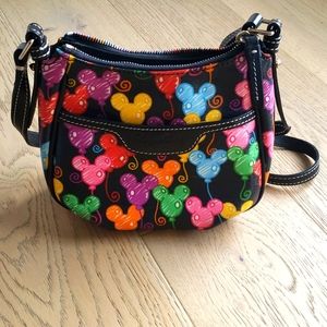 Dooney and Burke small Disney crossbody. Used condition.